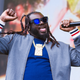 Image for article titled Watch T-Pain have a sloppy lightsaber fight in downtown New York City